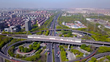 aerial view of highway junctions with roundabout. bridge roads shape circle in structure of architecture and transportation concept. top view. urban city, shanghai, china.