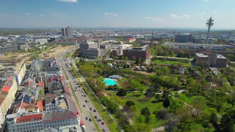 aerial drone forward moving shot over vienna skyline along city centre in vienna downtown street view from above in austria