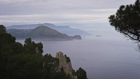 wide view of sorrento and amalfi coast from capri during a cloudy day, timelapse