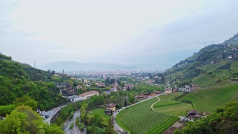 roncolo city between mountains in italy, aerial view