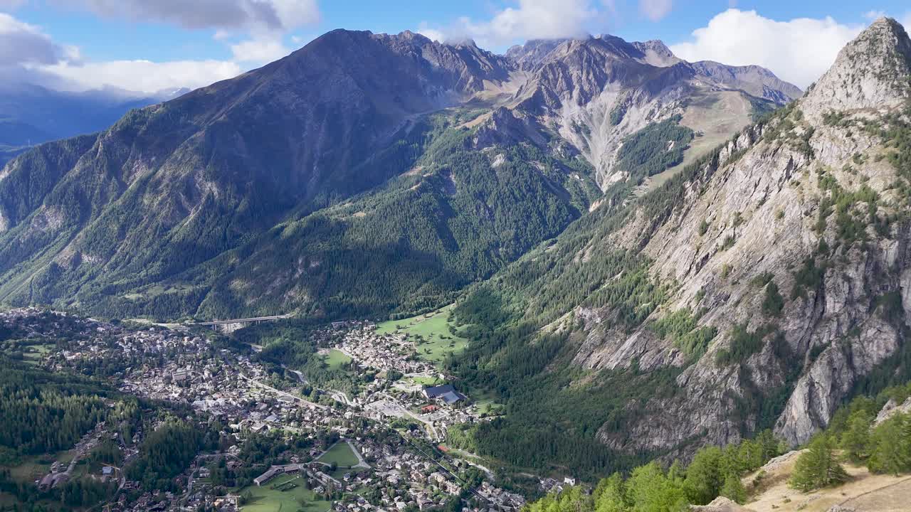 4K high resolution aerial drone video from the famous rifugio Bertone- Italy capturing the beautiful alps and the town of Courmayeur, an important milestone of the Famous TMB Tour du Mont Blanc Trail
