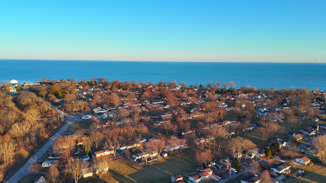 Wide drone view of Stony Point town on Lake Erie shoreline in Michigan, USA