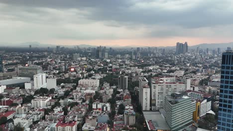 aerial view of mexico city skyline at sunset
