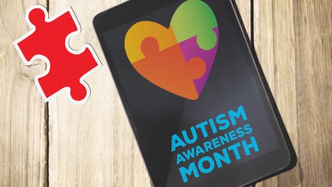 Animation-of-red-and-yellow-puzzle-pieces-falling-over-autism-awareness-month-text-on-smartphone