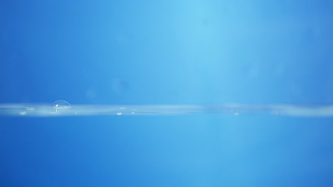 water surface with drops and bubbles