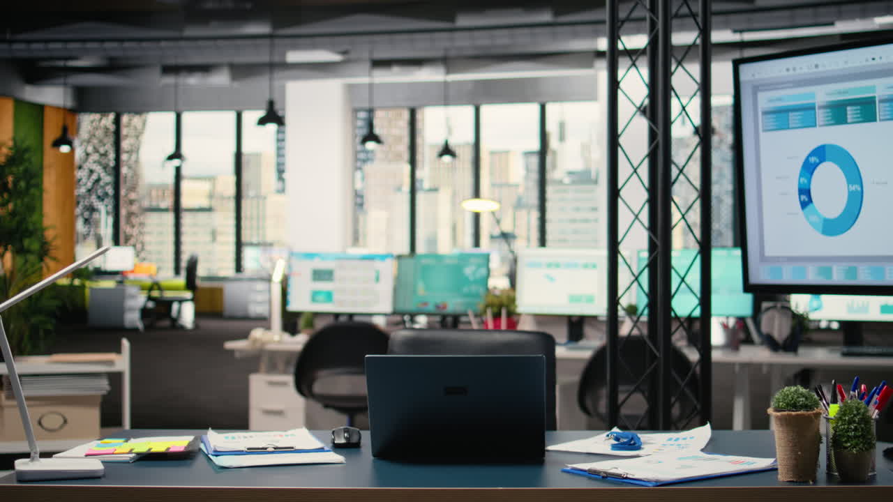 Vertical Video Modern business desk in empty office showcases workspace prepared for analytics