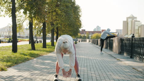 people stretching outdoors