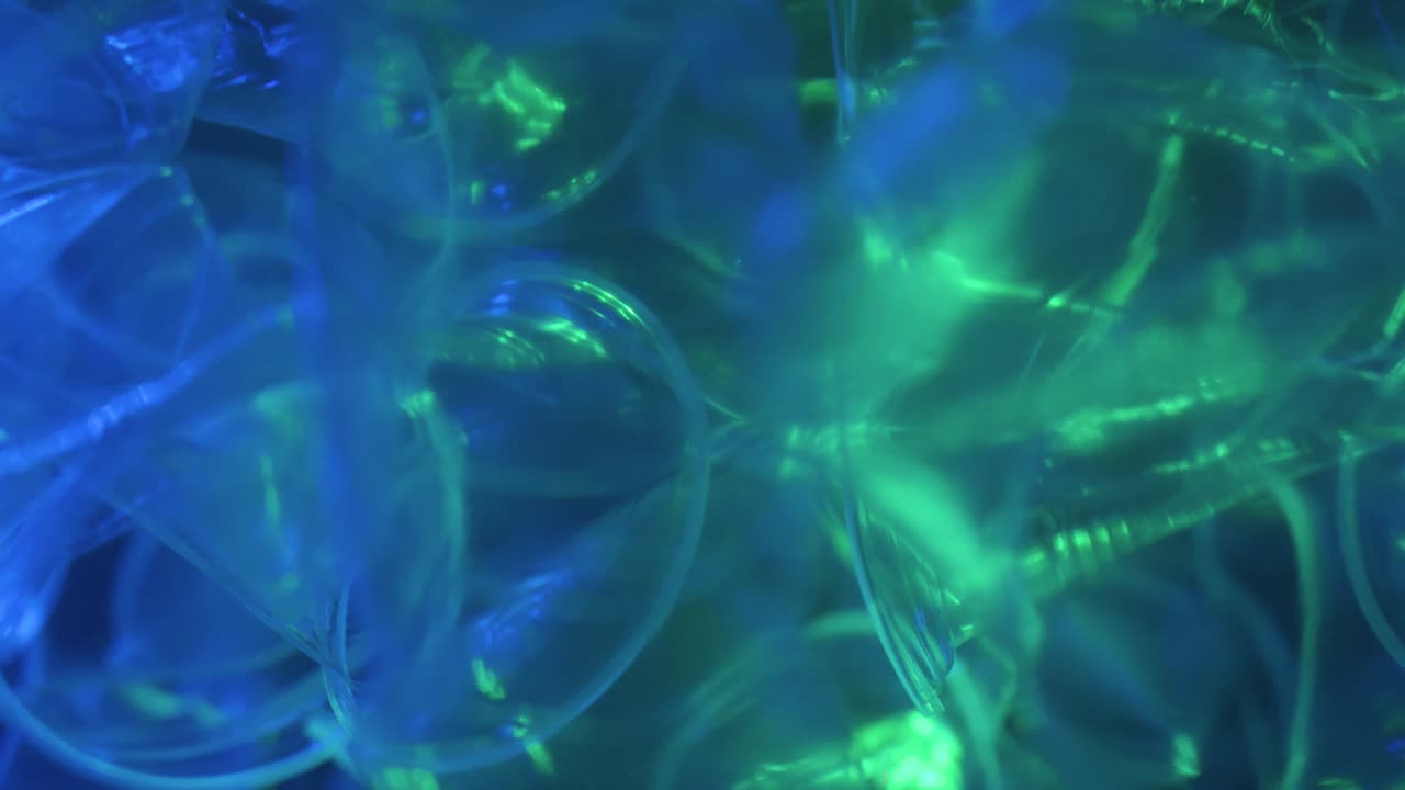 Waste Plastic Bottle falling down in the Indian ocean.Bottle falling down loop of slow motion in background.Video 4K Resolutions.