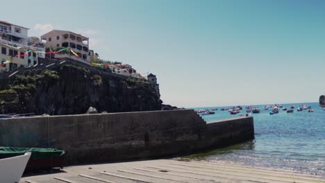 coastal fishing village harbor on sunny day