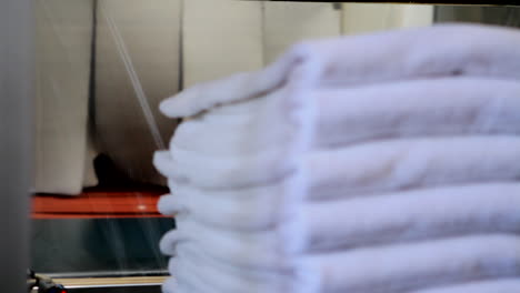 white towels are wrapped in a transparent protective foil