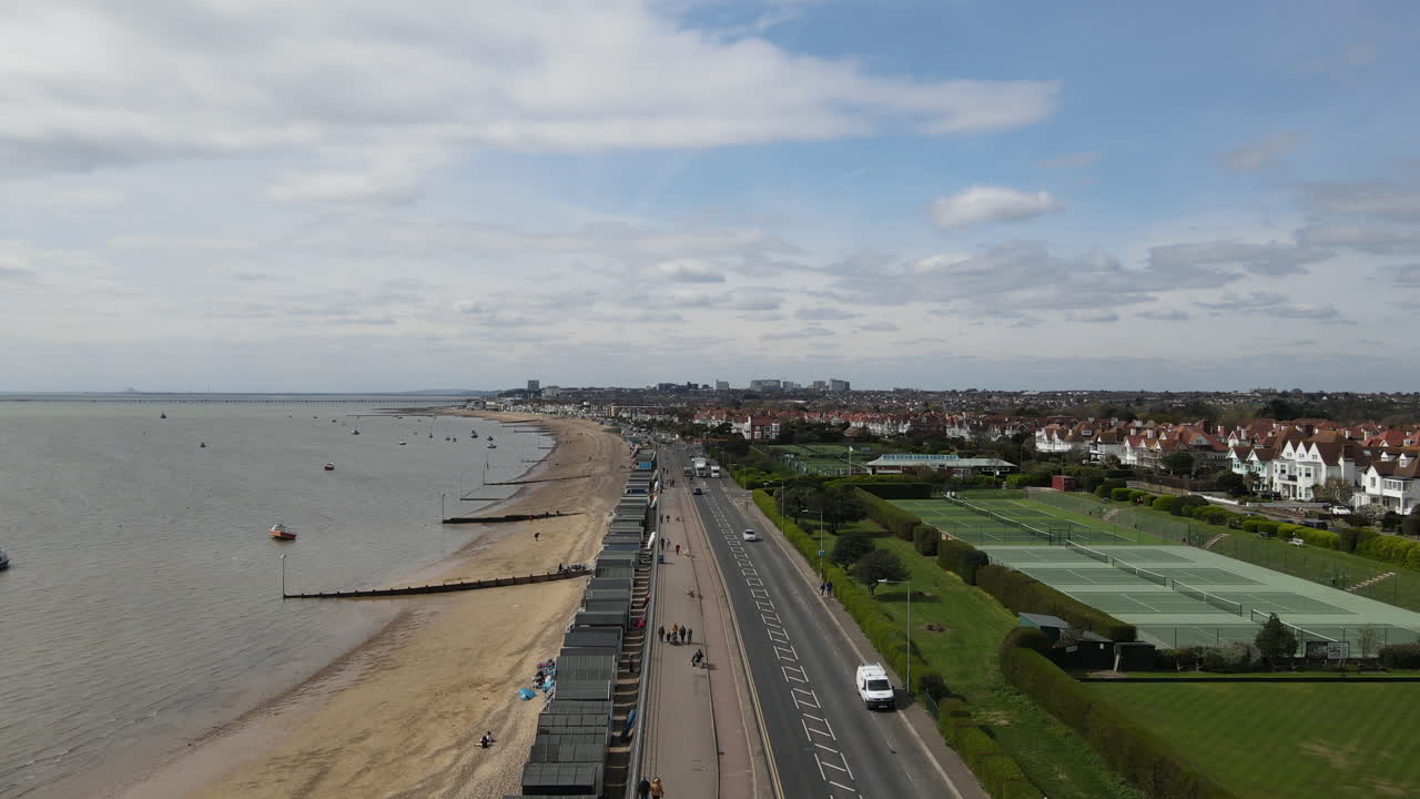 Aerial Beach Shot From Above. UK Drone Over Sea And Sandy Beach. 4k Stock Video Aerial View Of UK Sandy Beach Seascape.