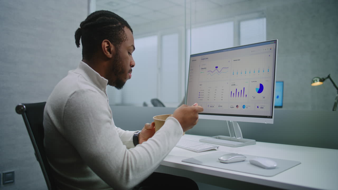 Businessman Analyzing Data During Lunch Break