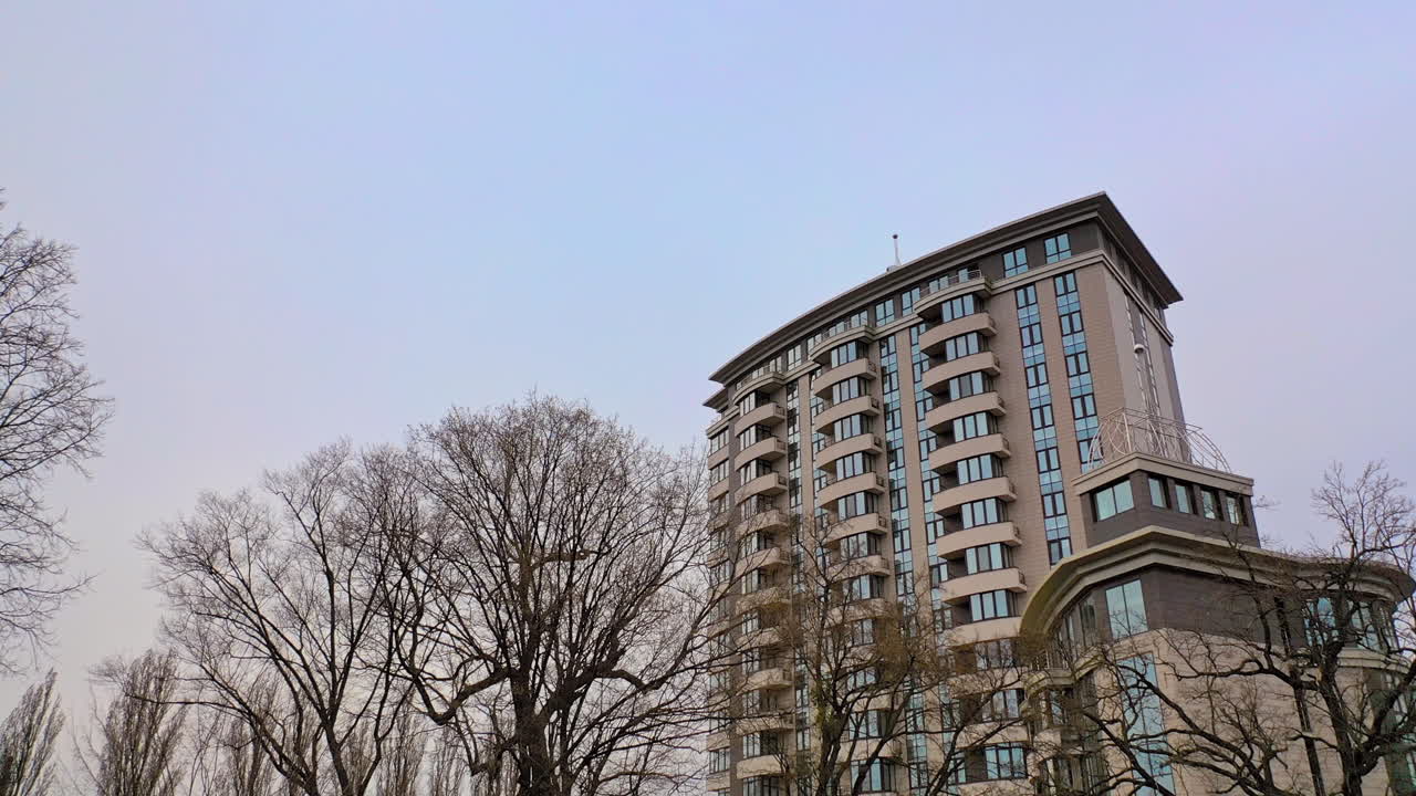 Luxury high rise apartment buildings. Aerial view of the exterior of modern constructed real estate located in downtown