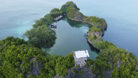 raja ampat rufas island in indonesia aerial drone landscape and blue water in lagoon