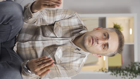 Vertical-video-of-Muslim-man-praying.