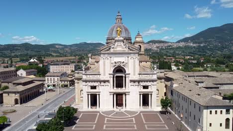 aerial shot of a church in italy at daytime, descending view