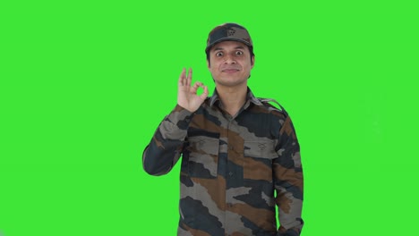 Happy-Indian-army-man-showing-okay-sign-Green-screen