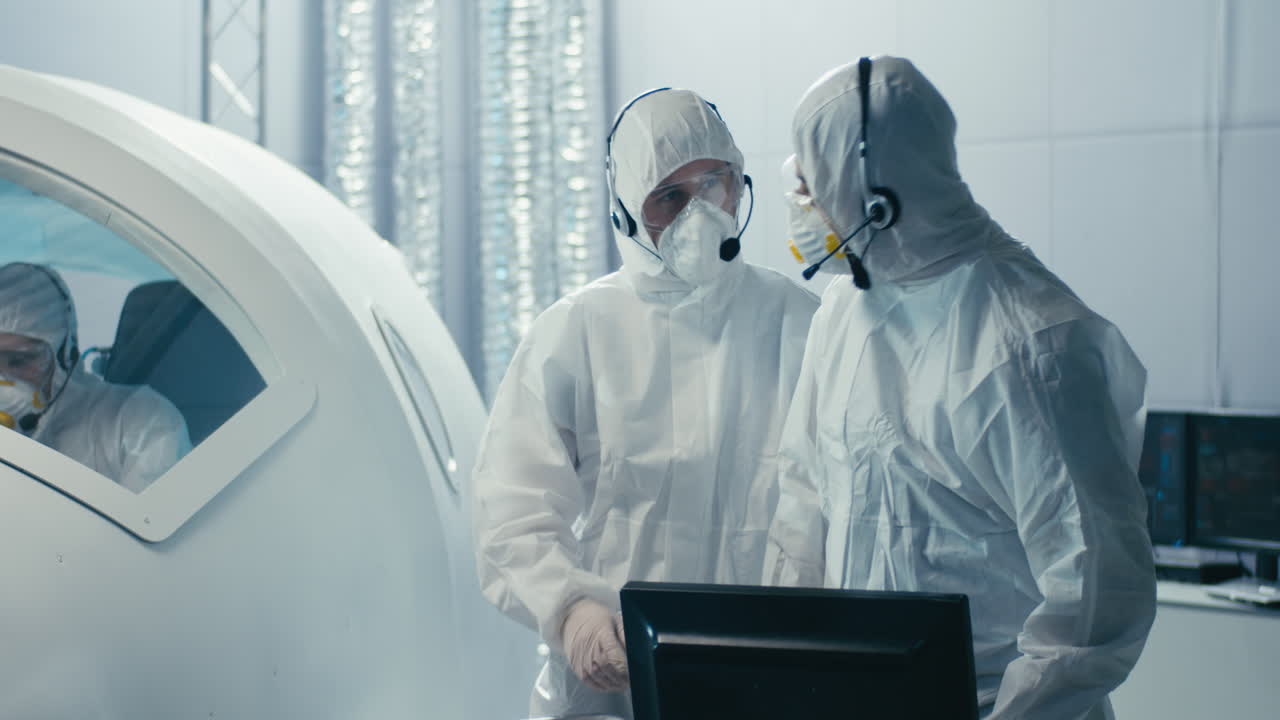 Scientists Monitoring Experiment in a Futuristic Laboratory