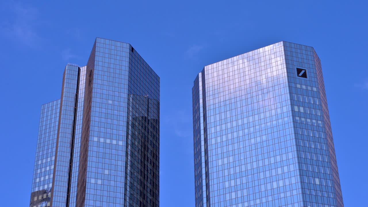 Frankfurt, Germany - November 13, 2022: Low angle view of the Deutsche Bank Twin Towers in Frankfurt, Germany