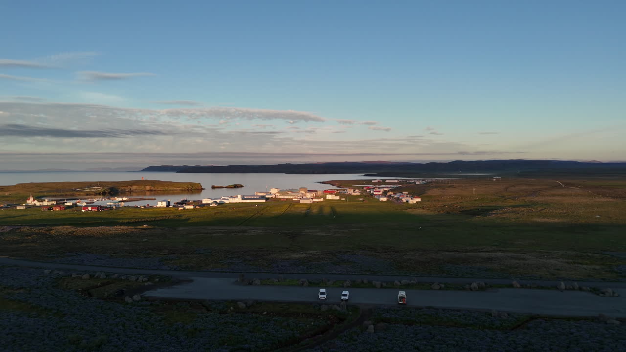 Aerial drone shot of Raufarhöfn town at sunset Iceland 1