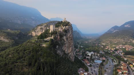 Picturesque-old-Arco-castle-on-cliff-above-Riva-del-Garda-city,-Trentino,-Italy