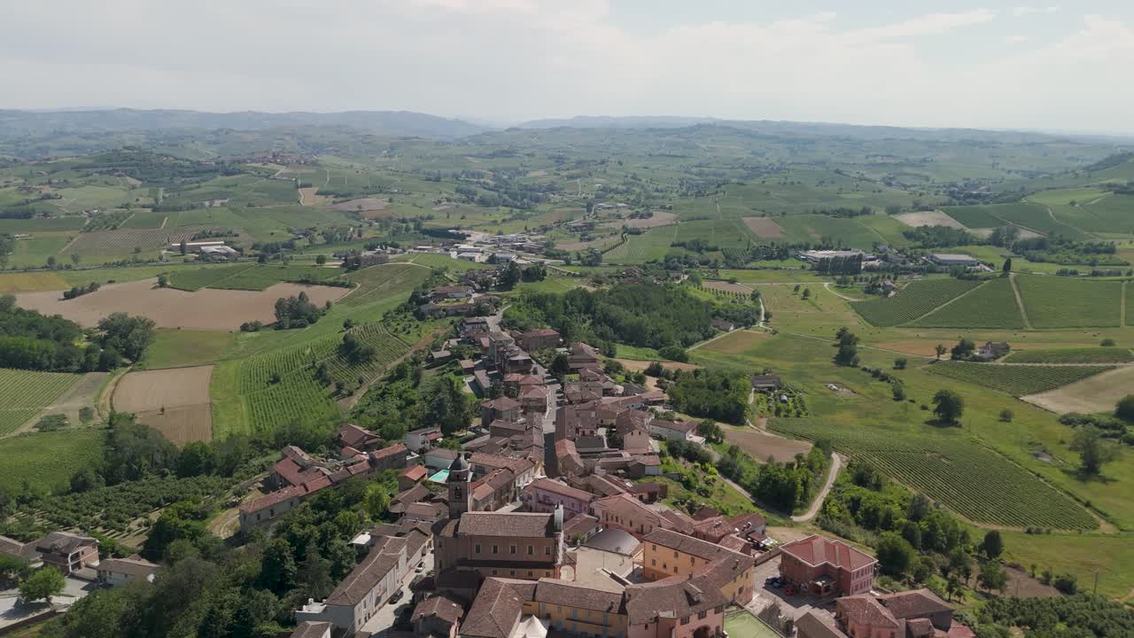 Castelnuovo Calcea, Monferrato region, Asti, Piedmont, Italy. 4k aerial view of the city. Langhe-Roero and Monferrato. Flying forward above the city and natural landscape.
