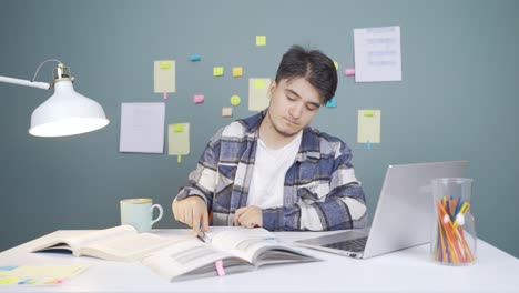 male student bored with studying.