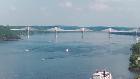 aerial telephoto rising shot of the st. croix crossing bridge from the historic commander building in stillwater, minnesota. 4k