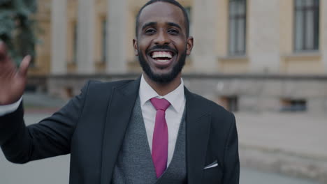 smiling businessman in suit