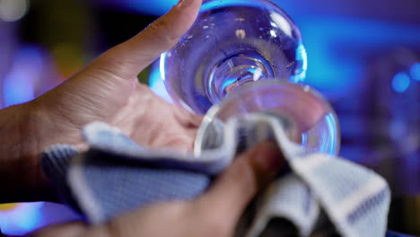 bartender cleaning a cup