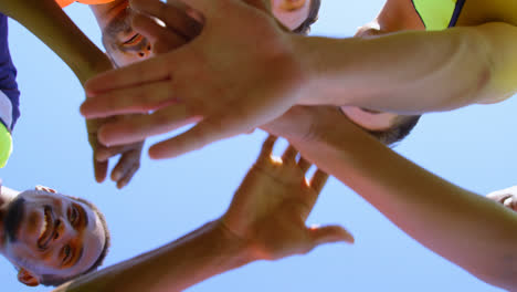 soccer players forming a huddle 4k