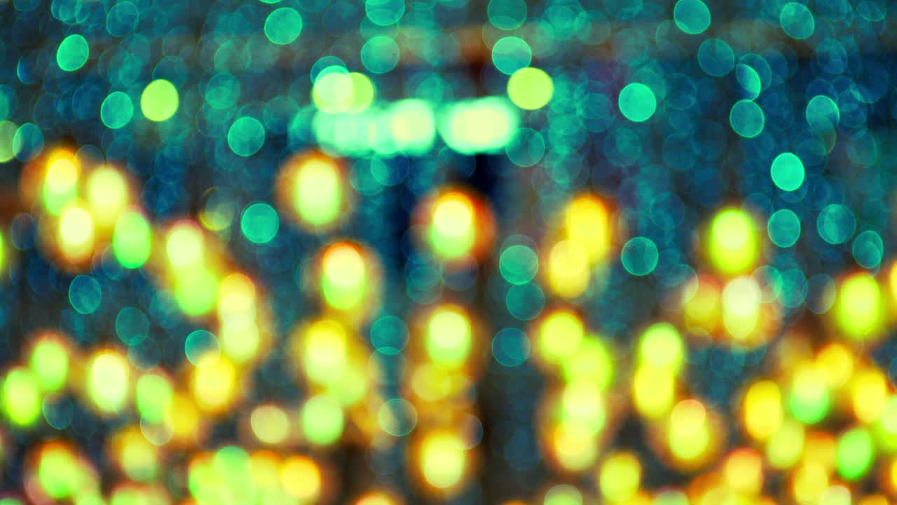 Fundo com luzes bokeh coloridas circulares em loop contínuo e desfocado