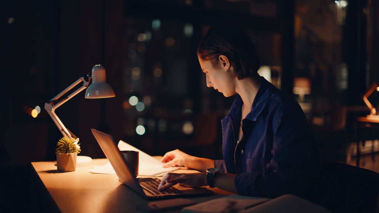 Woman workaholic typing laptop at night office closeup. Tired accountant work