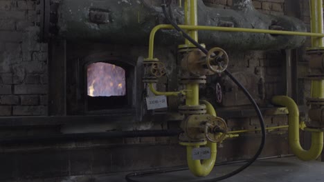 industrial boiler room with fire