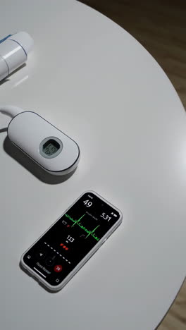 blood pressure monitor and smartphone display