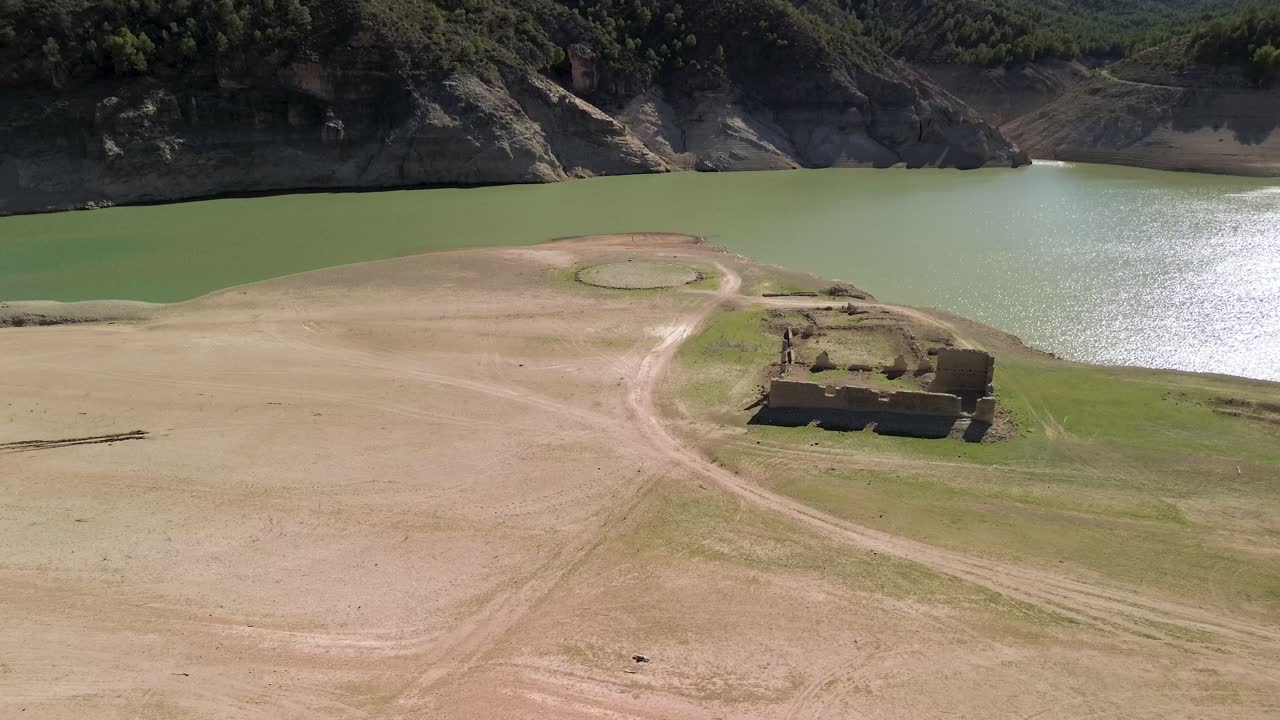 Wide shot of house ruins demolished by the construction of the Fuensanta Reservoir in Yeste, Albacete