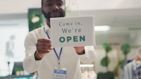 man reopening clothing shop