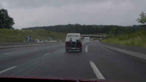 driving on a rainy highway