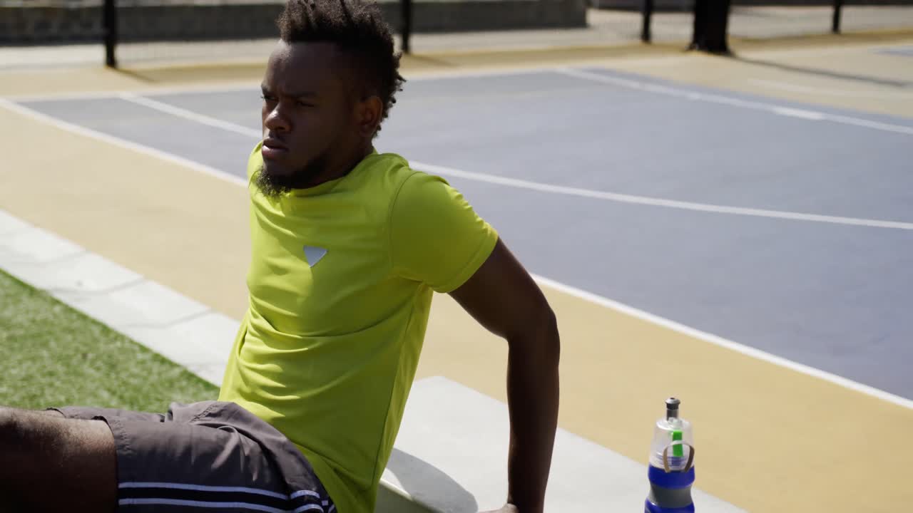 Basketball player exercising in basketball court 4k