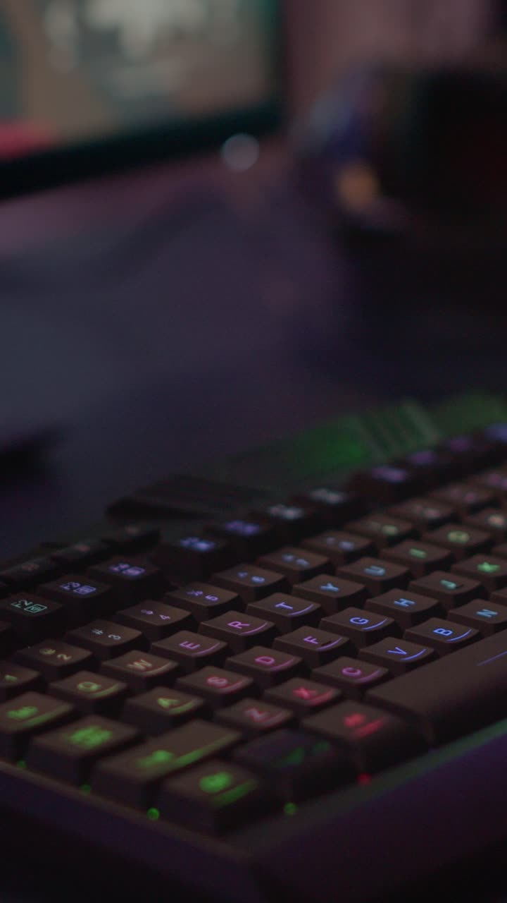 RGB Backlit Gaming Keyboard in a Dark Room
