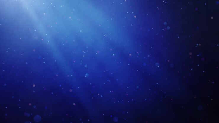 Sfondo astratto blu con particelle luminose e raggi di luce