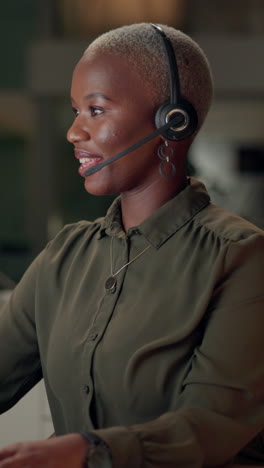 woman with headset in office