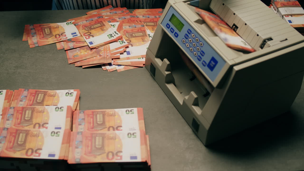 Specialised police officer Counting dollar banknotes in crime lab, conceptual image. High quality 4k footage