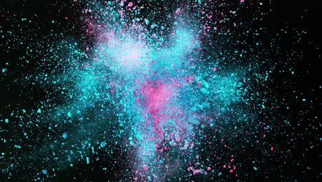 super slow motion of colored powder explosion isolated on dark background.