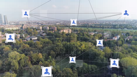 animation of webs connections and social icons over a cityscape