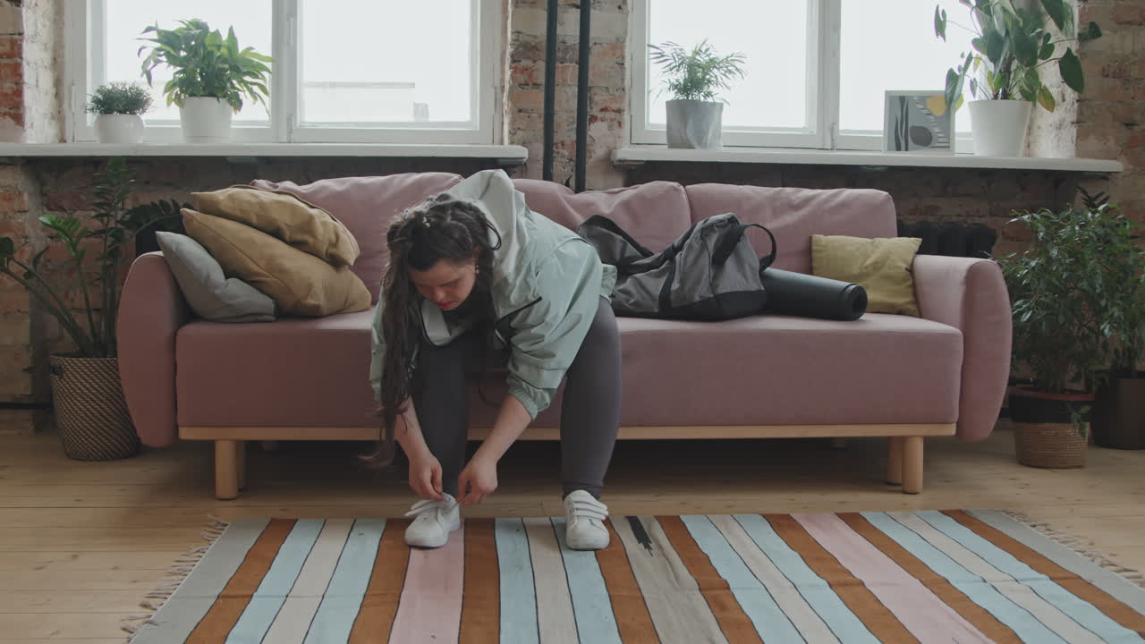 Young Woman With Down Syndrome Leaving Home For Sports Training