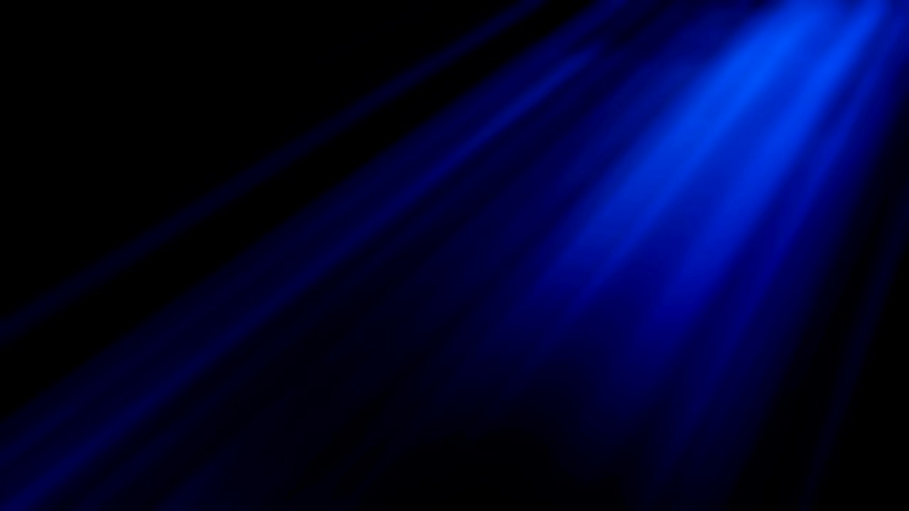 Volumetric rays of light shining from above penetrate through the thick airy veil. Looped