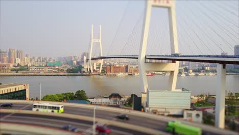 sunny day shanghai city famous traffic round road junction aerial top view 4k tilt shift china