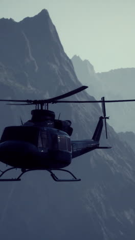 helicopter flying over mountains