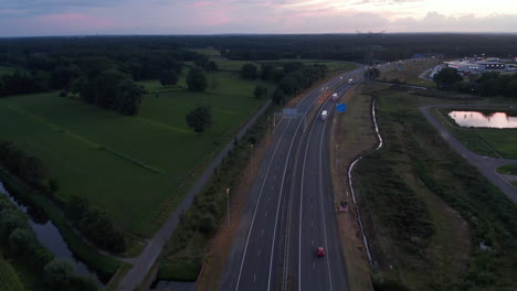 Wide-Establisher-over-Freeway-in-Netherlands-at-Sunset